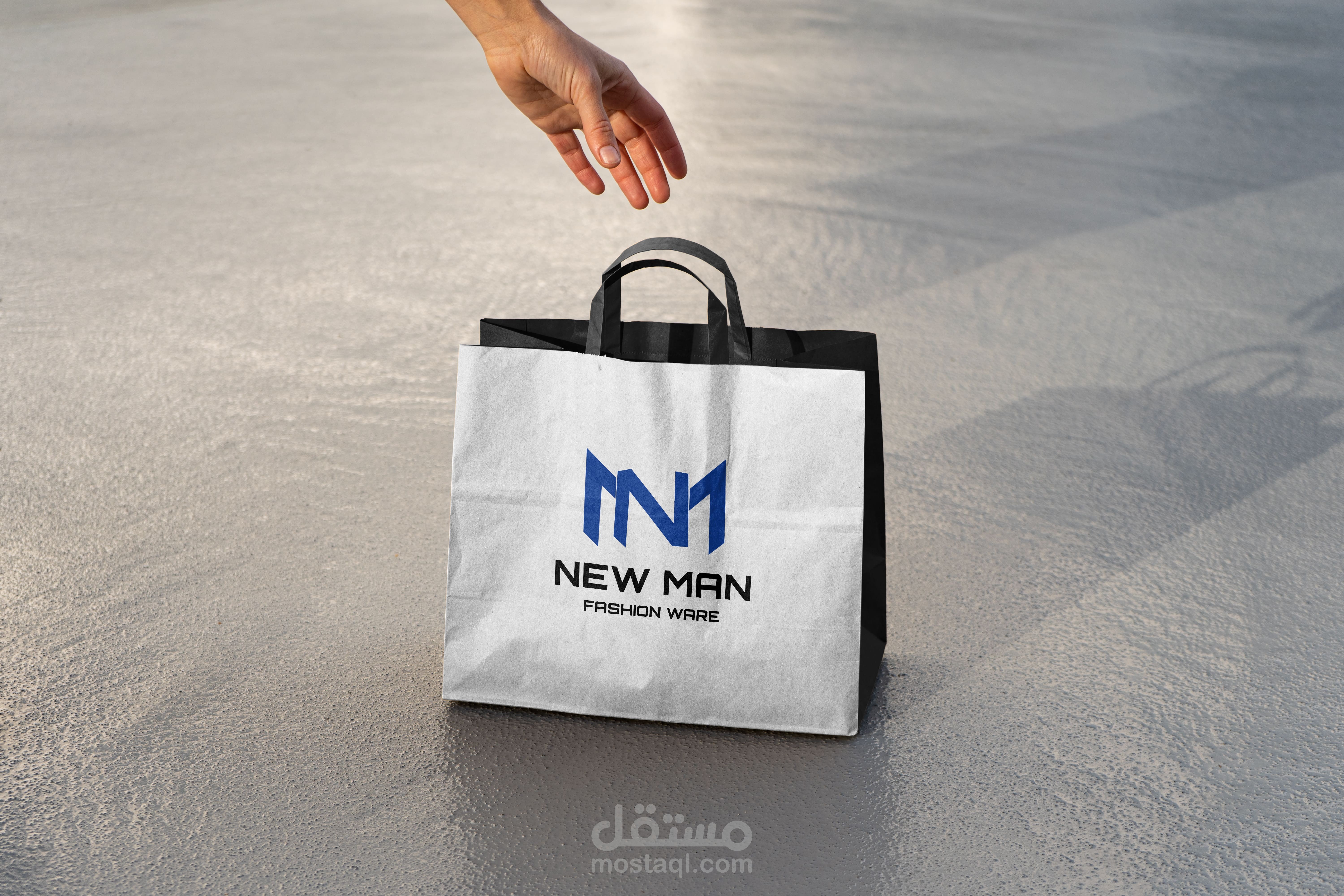 ريبراند لمحل ملابس بإسم New Man
