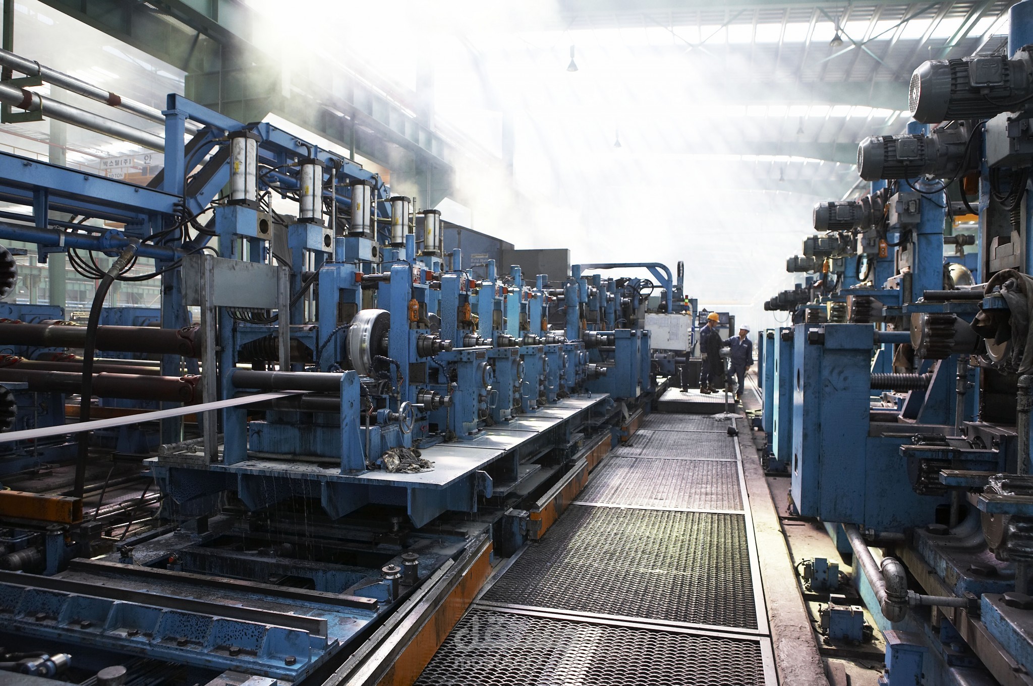 Revamping and modernizing the production lines of a steel factory by enhancing the existing PLC control systems to a newer