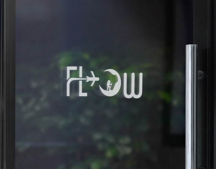 شعار يدعو للسفر والمغامرة لمتجر هدايا اسمه flow